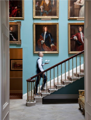 Stair Hall With Waiter walking upstairs